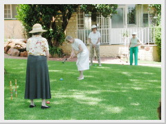 Playing crochet in the gardens of the German Old Age Home