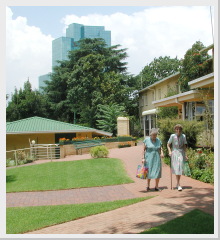 Friends walking in the gardens of the German Old Home